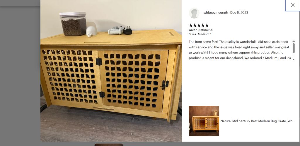 Wooden pet crate with lattice design on a gray floor, next to a product description card.
