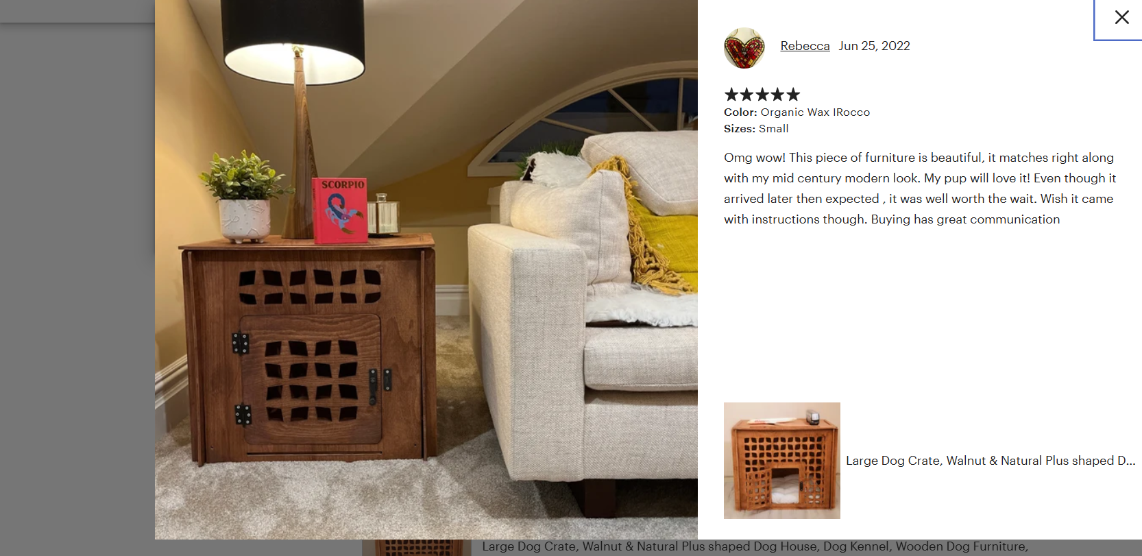 Living room with wooden cabinet, gray sofa, and decorative items.